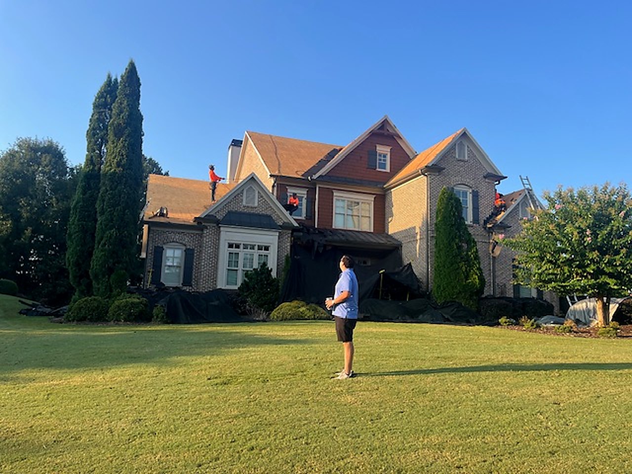 Slate tear-off with full crew on deck