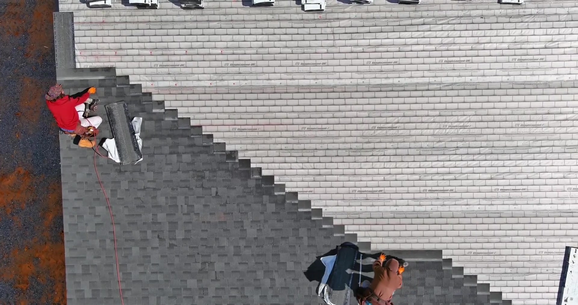 Roof Now crew installing a new asphalt shingle roof on an Atlanta home